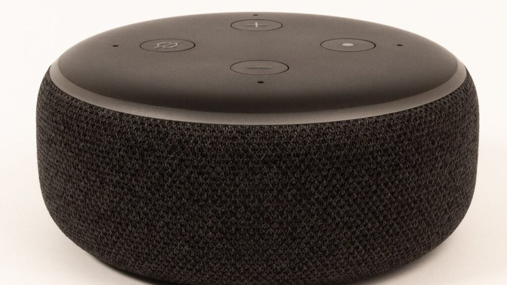 Alexa not responding: an Echo smart speaker sitting silent on a table