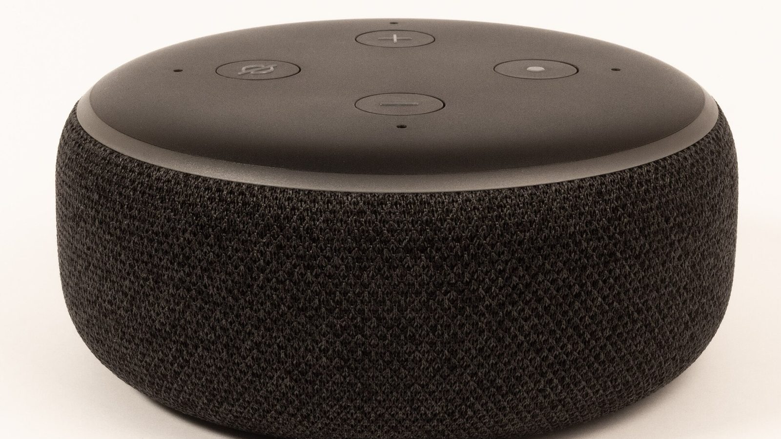 Alexa not responding: an Echo smart speaker sitting silent on a table